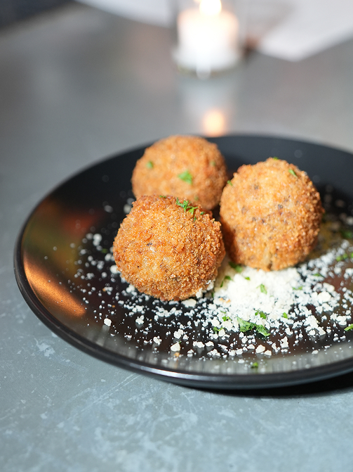 A plated dish at Poppy East Village.