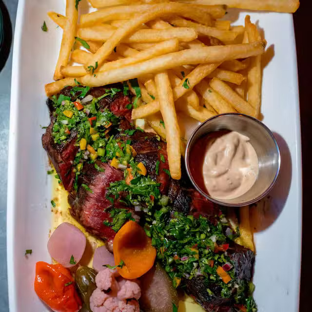 Steak frites served at Poppy East Village.